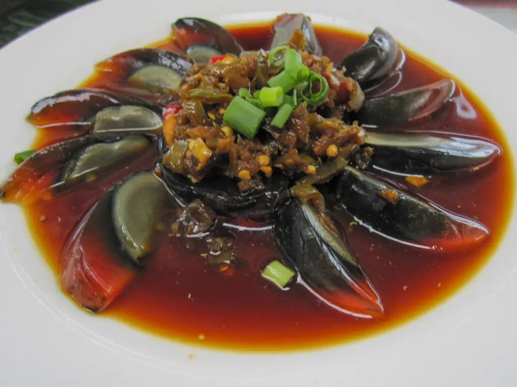 Century eggs are exotic foods in China that you should eat. They are also weird Chinese food.